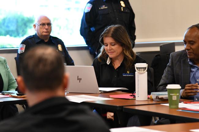 Several people attending a meeting.