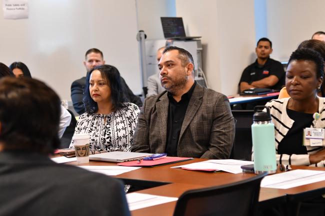 Several people attending a meeting.